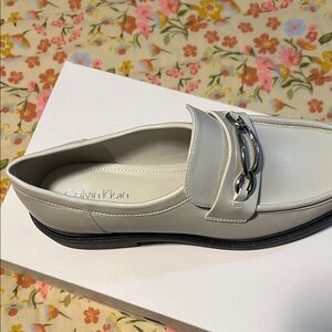 Calvin Klein Off-White Loafers with Silver Accent